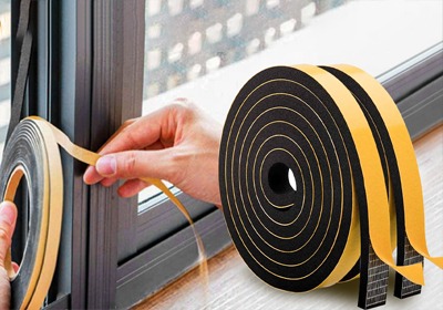 Self-adhesive rubber strips sealing door gaps to improve insulation and reduce energy